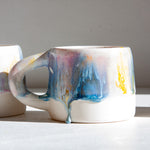 handmade ceramic purple, yellow, peach and blue mug
