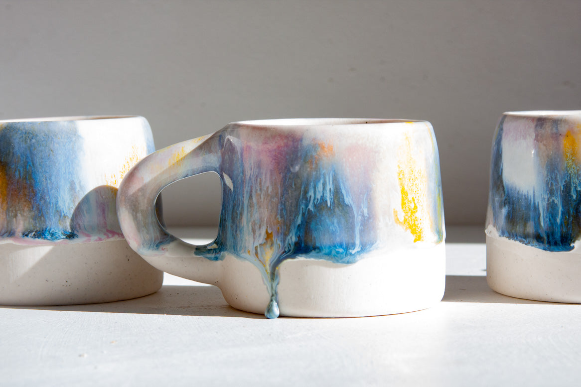 handmade ceramic purple, yellow, peach and blue mug