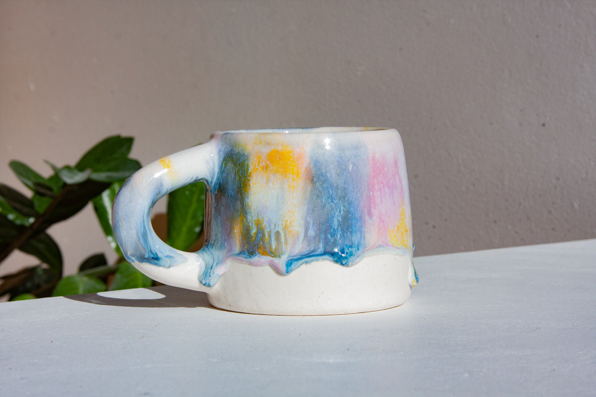 handmade ceramic purple, yellow, peach and blue mug