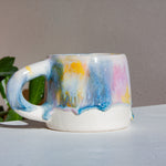 handmade ceramic purple, yellow, peach and blue mug