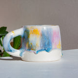 handmade ceramic purple, yellow, peach and blue mug