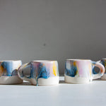 handmade ceramic purple, yellow, peach and blue mug