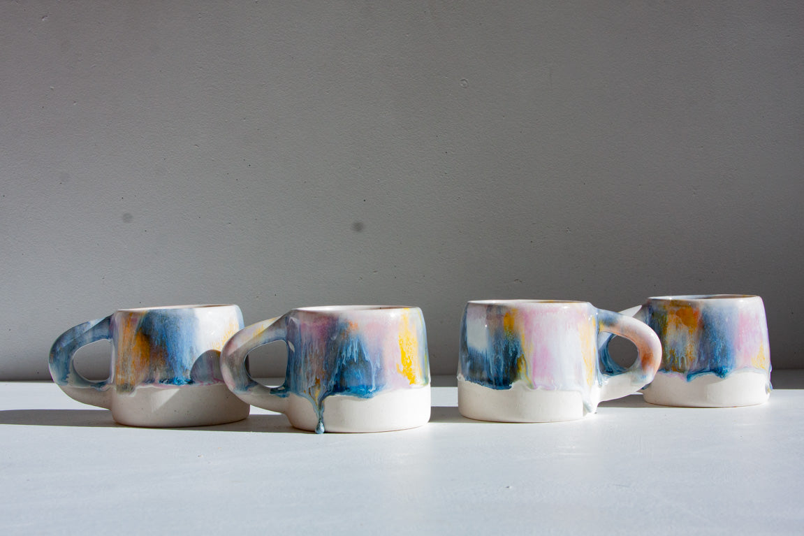 handmade ceramic purple, yellow, peach and blue mug