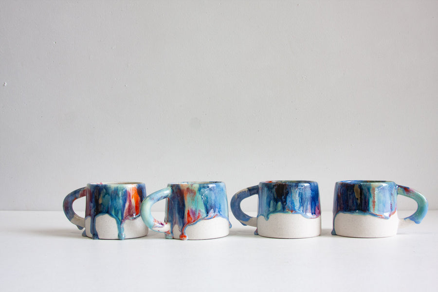 handmade ceramic blue , green, orange, red mug 