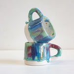 handmade ceramic green, blue and red mug 