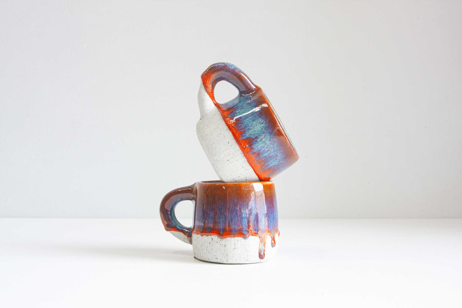 handmade ceramic blue and orange mug