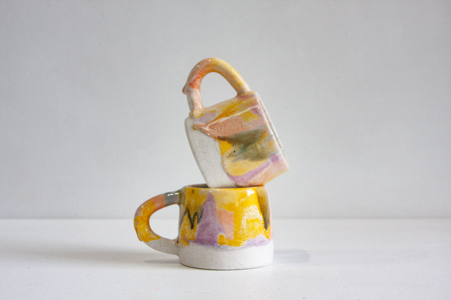 handmade ceramic yellow, purple, peach and blue mug