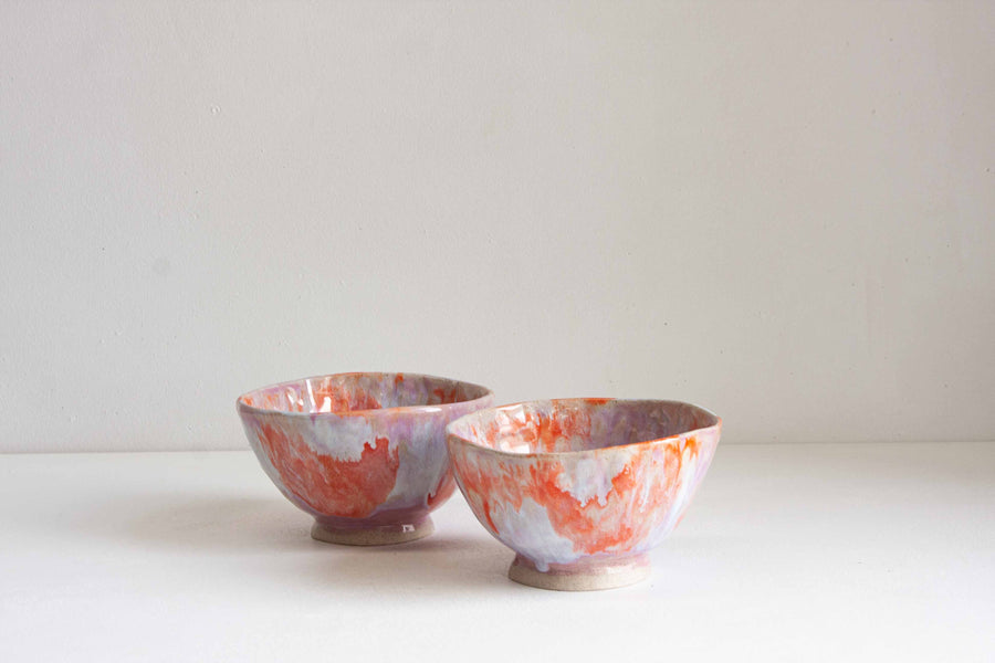 handmade ceramic orange and purple footed bowl 