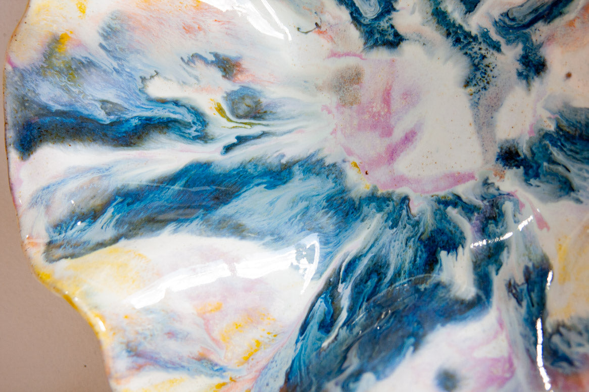 handmade ceramic wavy shaped purple, yellow, peach, blue and white bowl platter