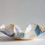 handmade ceramic wavy shaped purple, yellow, peach, blue and white bowl platter