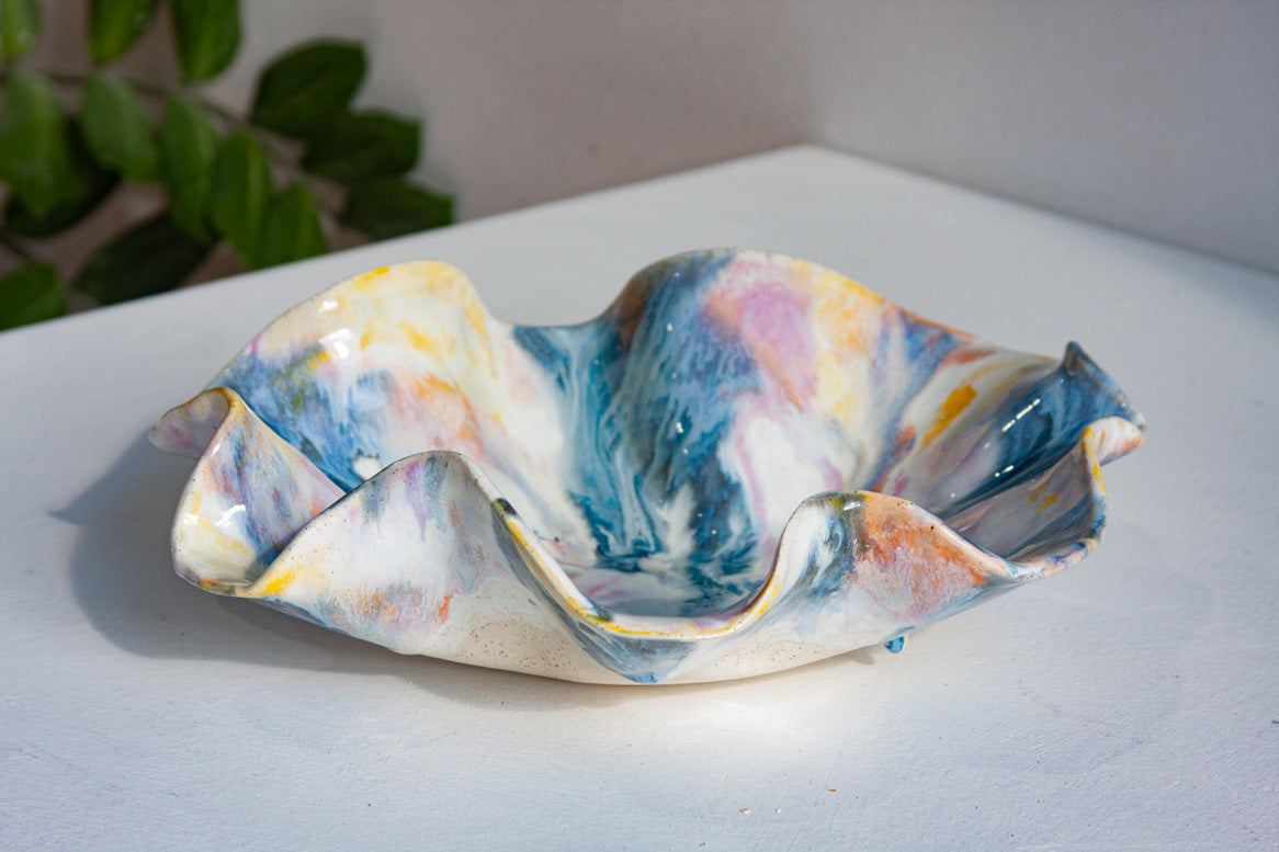 handmade ceramic wavy shaped purple, yellow, peach, blue and white bowl platter