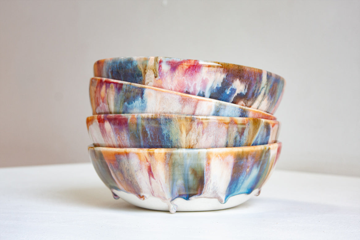 handmade ceramic pasta bowl glazed in blue, pink, brown and white.