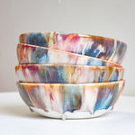 handmade ceramic pasta bowl glazed in blue, pink, brown and white.
