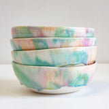 handmade ceramic pasta bowl, glazed in pastel green, peach and purple.