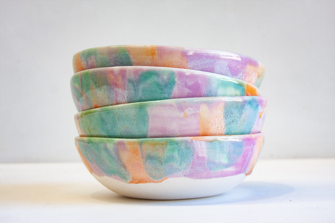 close up of four ceramic handmade pasta bowls