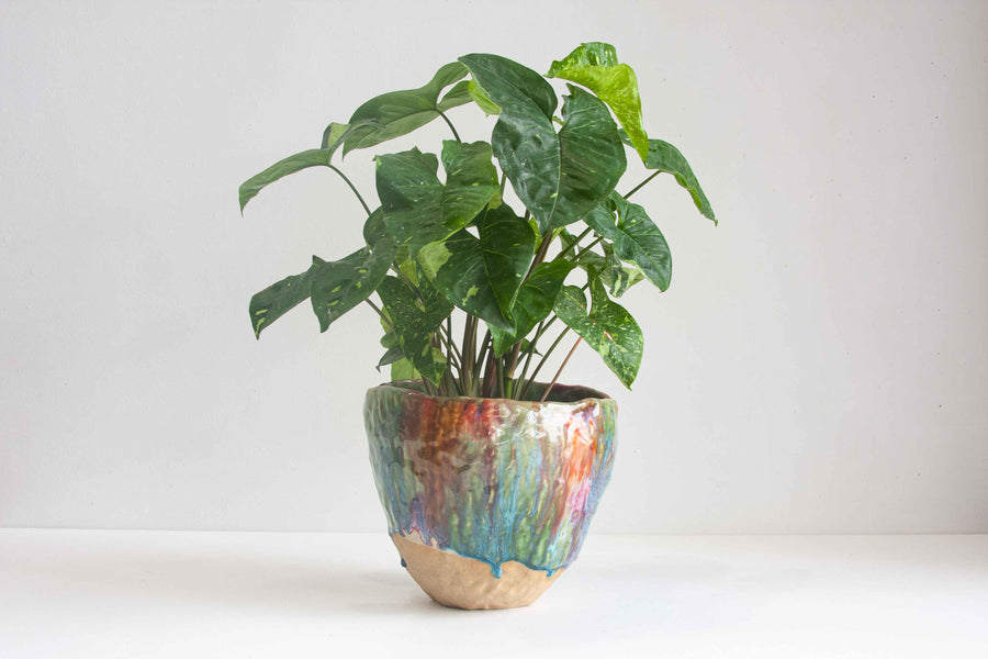 handmade ceramic planter glazed in green, orange, red and brown