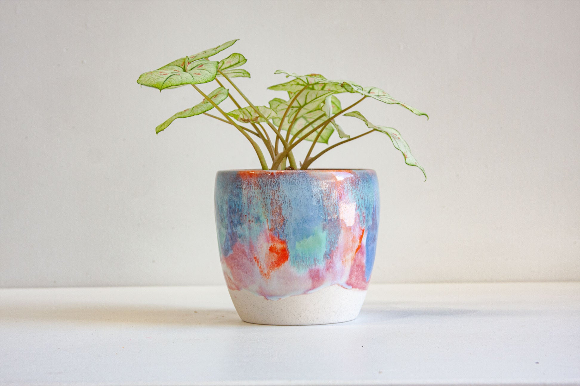 handmade ceramic blue, green pink and orange planter