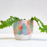 handmade ceramic planter glazed in green, purple, orange and peach