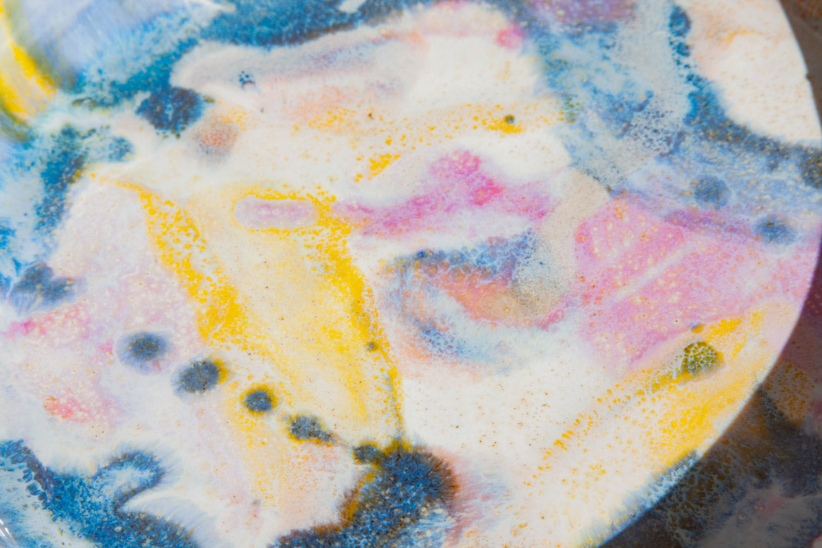 handmade ceramic purple, yellow, blue deep platter close up of the glaze