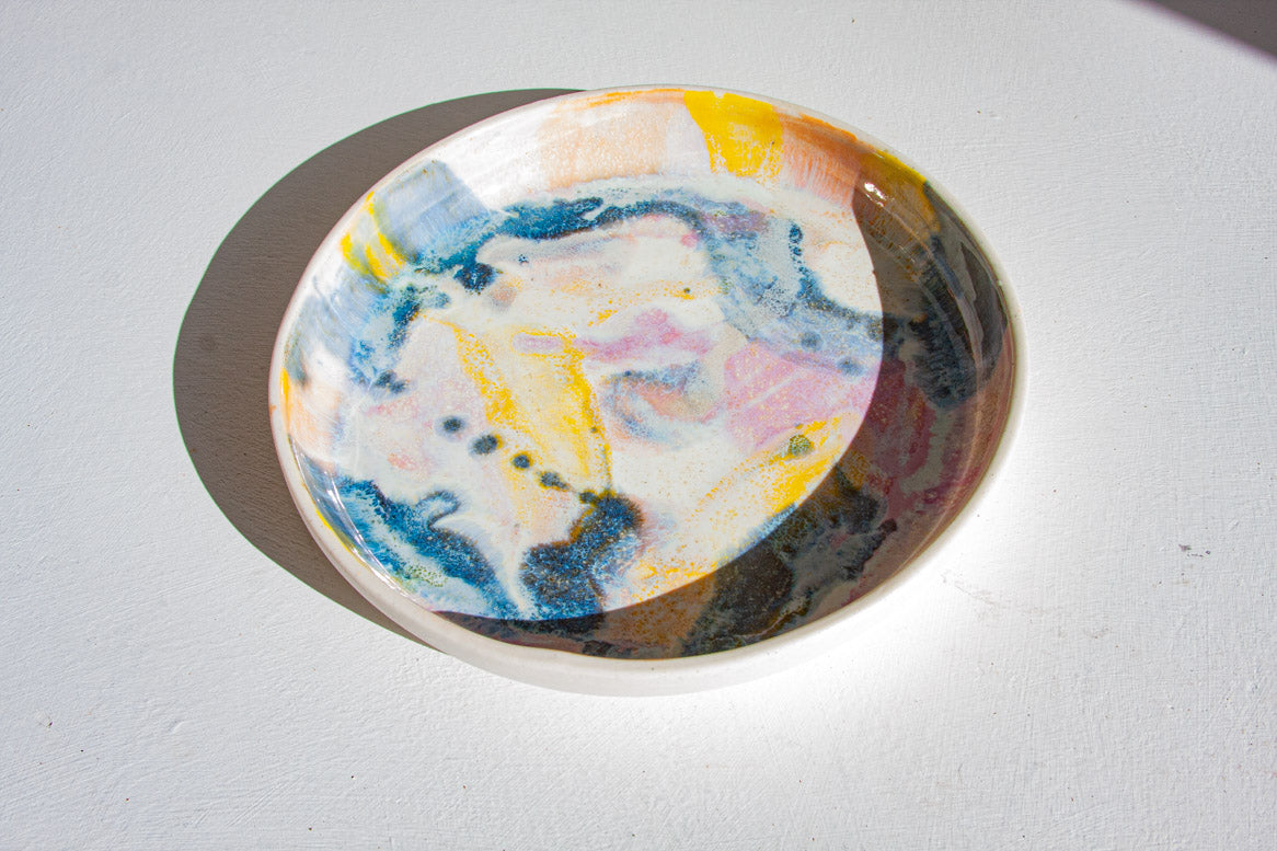 handmade ceramic purple, yellow, blue deep platter from above