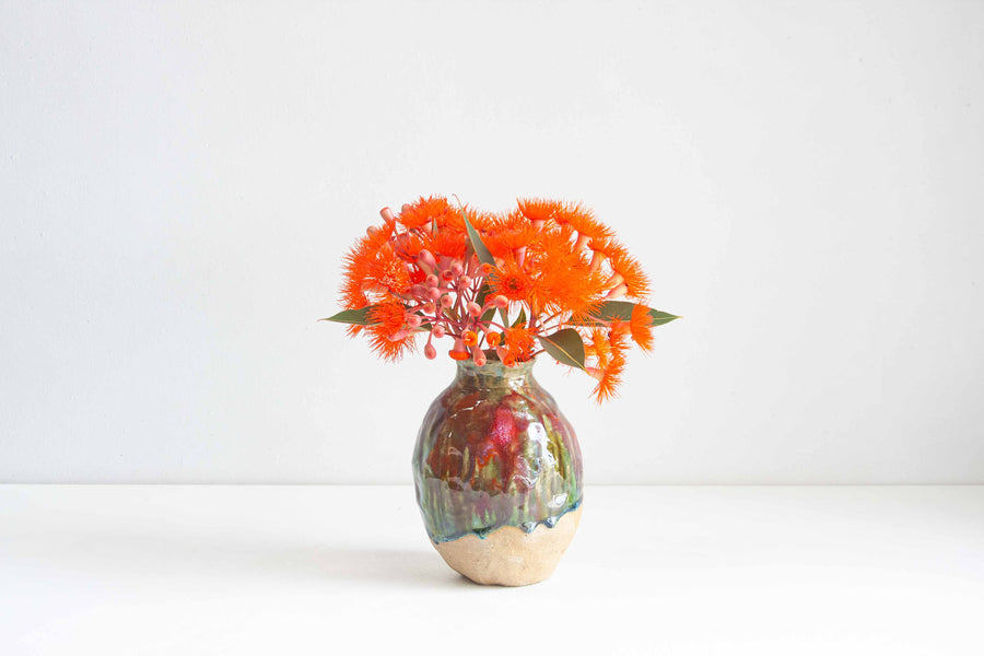 handmade ceramic green, orange, brown and red vase