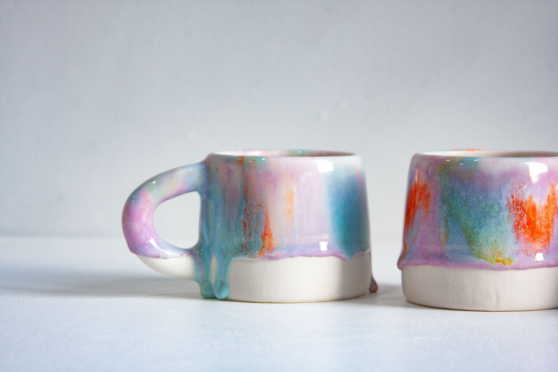 handmade ceramic green, purple, yellow and orange mug