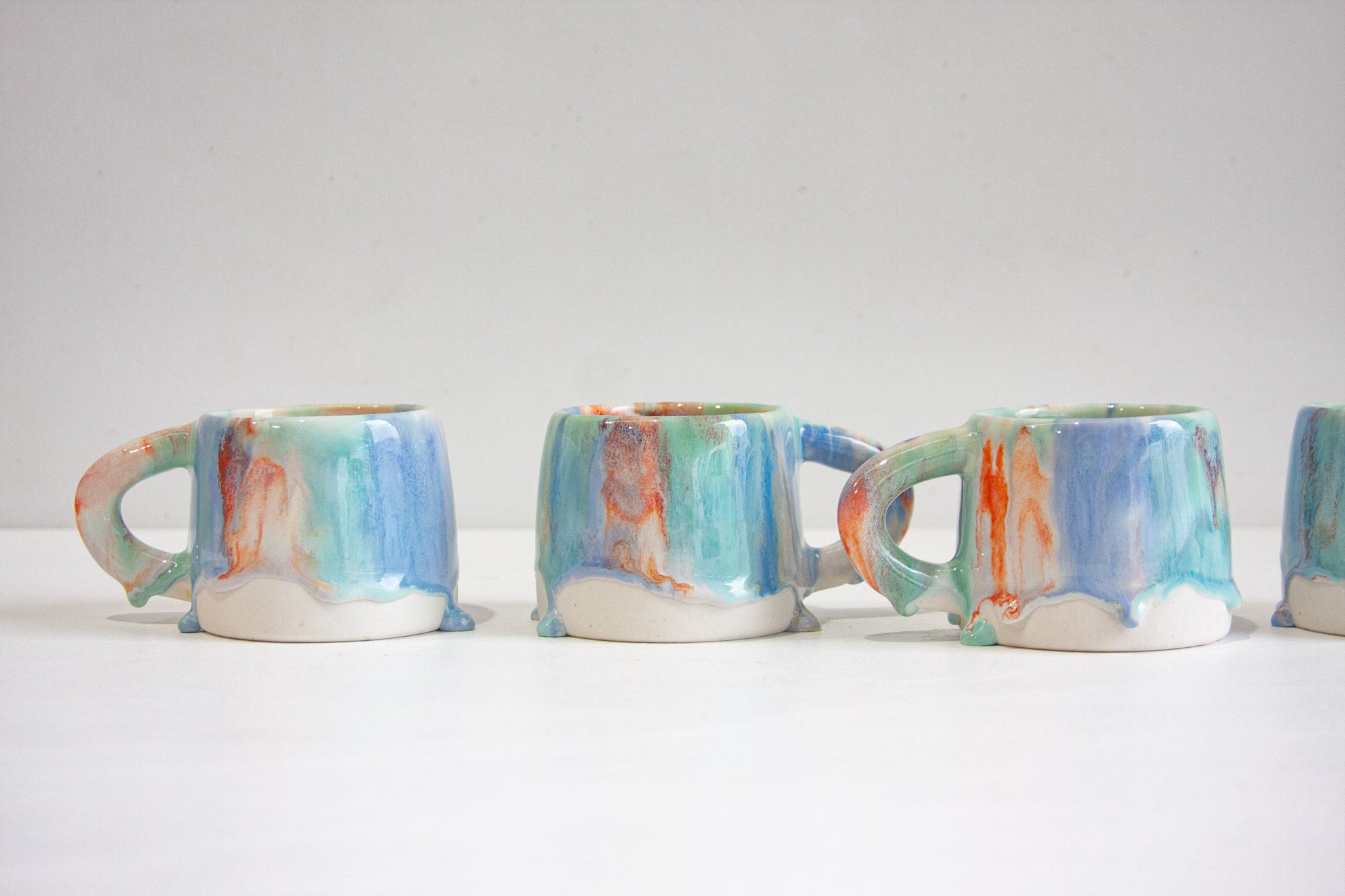 handmade ceramic drippy glazed mugs
