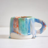 handmade ceramic blue, green, light purple and orange mug