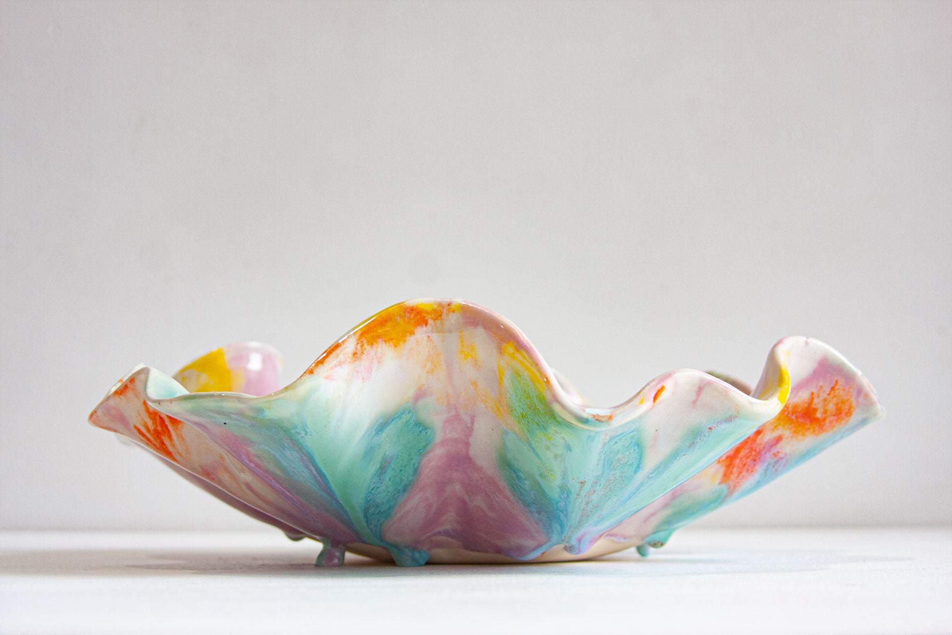 side view of handmade ceramic wavy platter