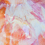close up of cream, pink, brown glaze details on a handmade ceramic vase.