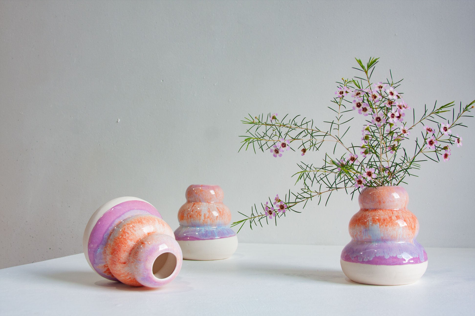 handmade ceramic purple and orange sculptural vases