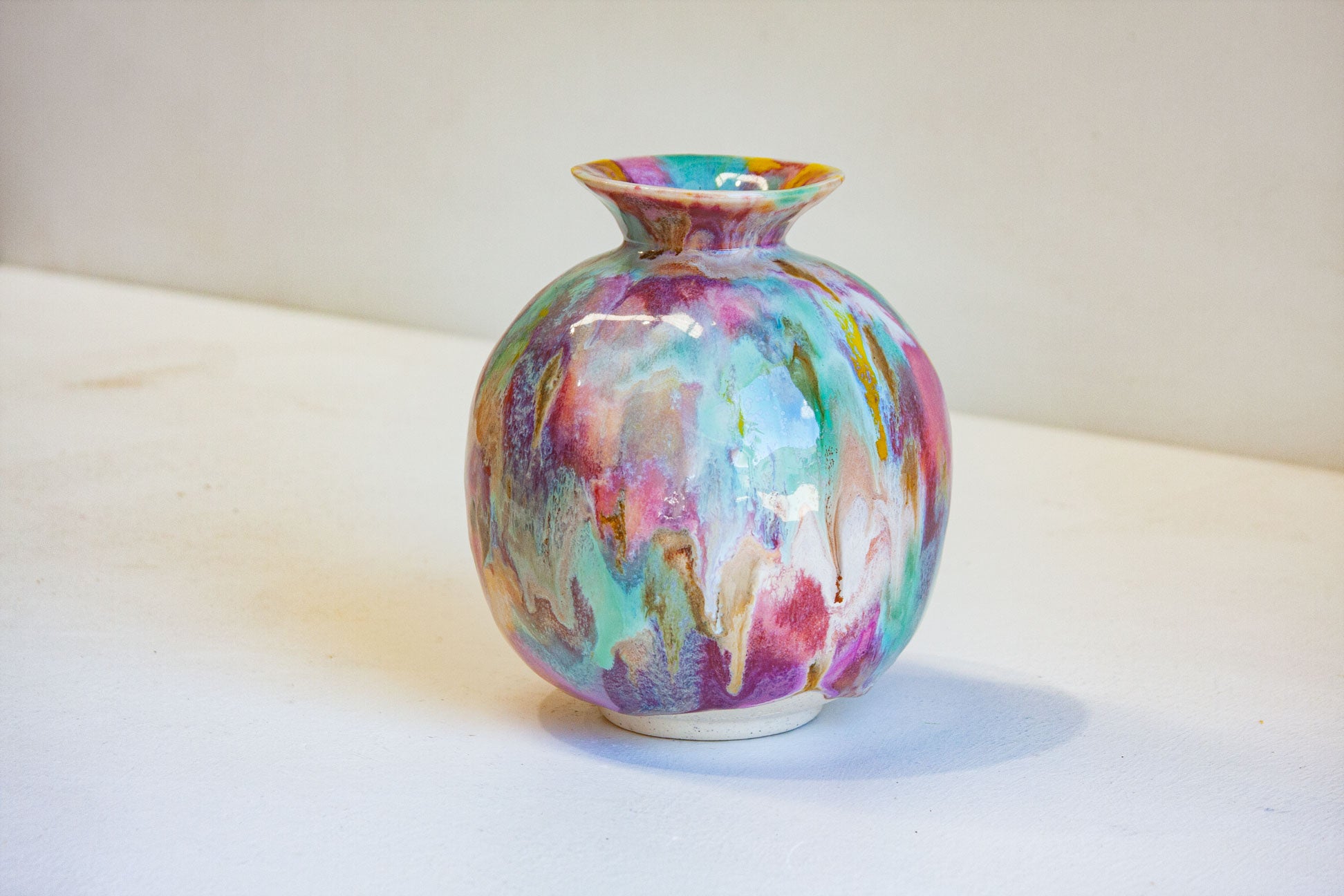 handmade ceramic multicoloured vase on a table