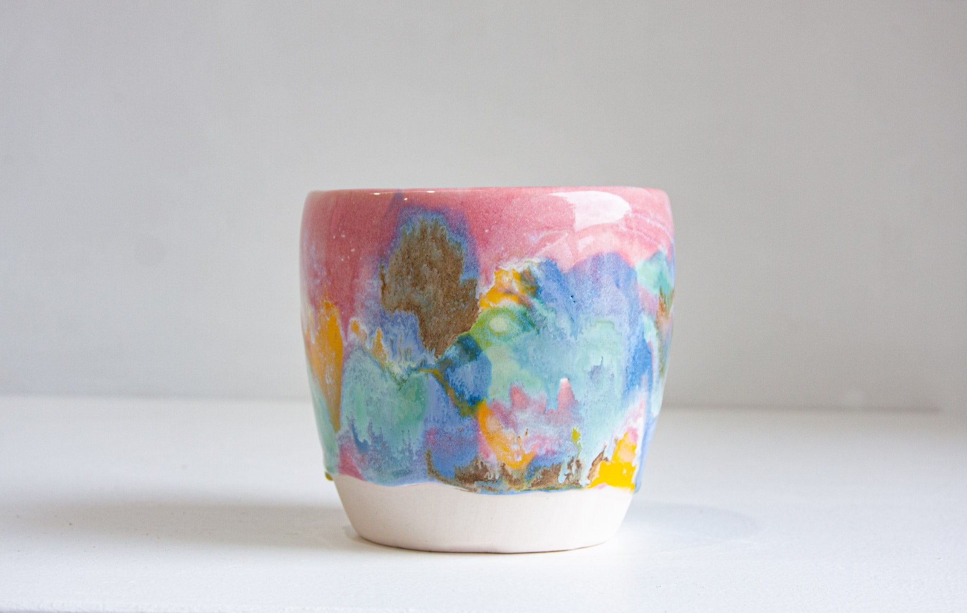 handmade ceramic pink, blue, yellow planter 