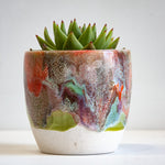 handmade ceramic green, red, brown and orange planter