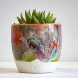 handmade ceramic green, red, brown and orange planter