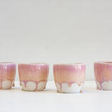 handmade ceramic peach and purple cup