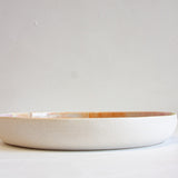 side on view of the handmade ceramic deep plate