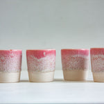 four handmade ceramic espresso cups glazed in speckled pink