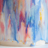 close up of glaze drips on the base of handmade ceramic table lamp
