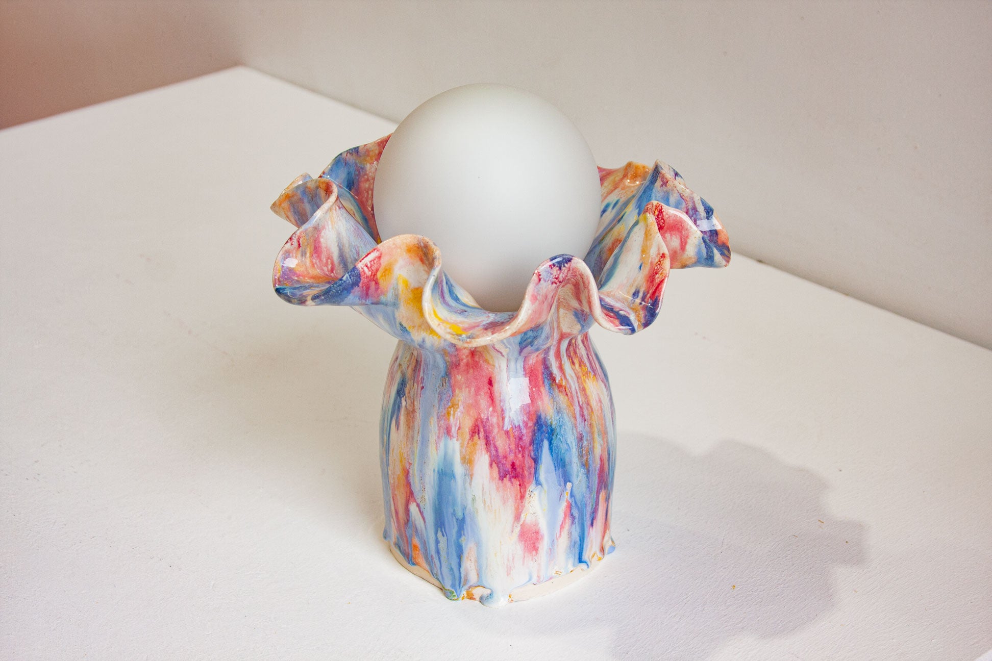 handmade sculptural oyster shaped ceramic table lamp with large bulb