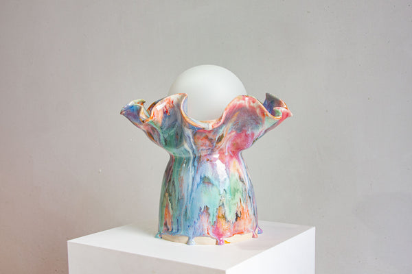 handmade ceramic table lamp on a plinth