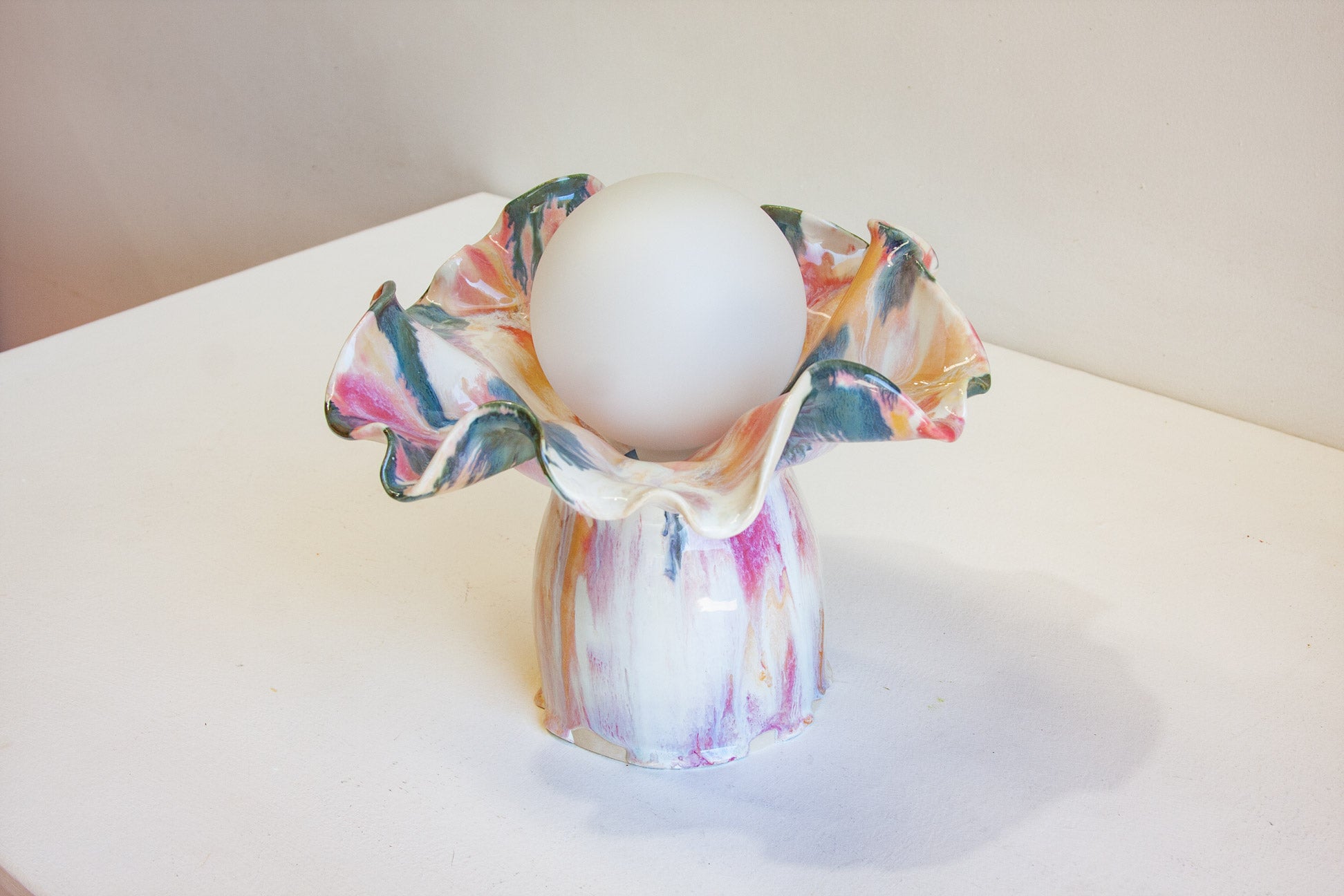 handmade ceramic table shown on table