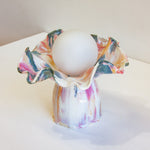 handmade ceramic table shown on table