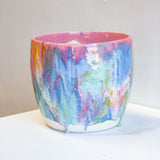 handmade ceramic pink, blue, green, yellow, brown and white glazed planter.