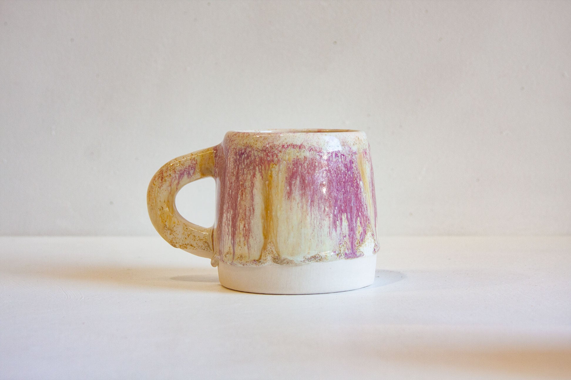 handmade ceramic pink, cream and brown mug 