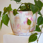 handmade ceramic planter with indoor plant