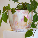 handmade ceramic planter with indoor plant