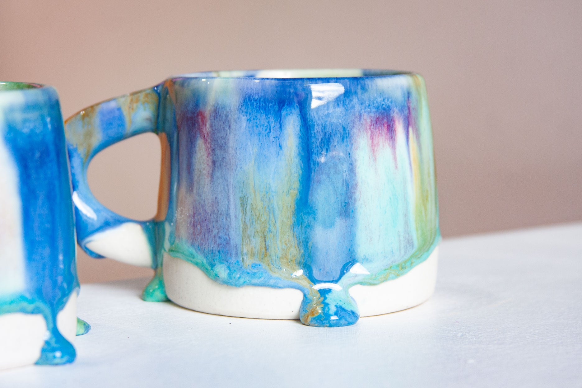 two handmade ceramic drippy glaze mug