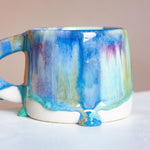two handmade ceramic drippy glaze mug