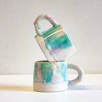 handmade ceramic mug in soft pastel colours